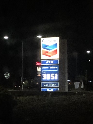 gas station sign at night. (Las Vegas, NV; Dec 27, 2021)