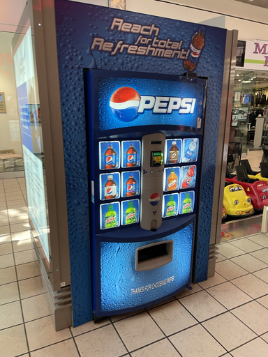 pepsi vending machine with old logo. (Dec 9, 2022)