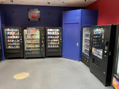 A very weird room filled with many vending machines.
