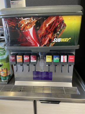 Subway soda fountain with some very old graphics.